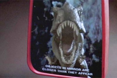 Jurassic-Park-rear-view-side-mirror-closer-than-they-appear-T-Rex-scene-car-explanation-400x268